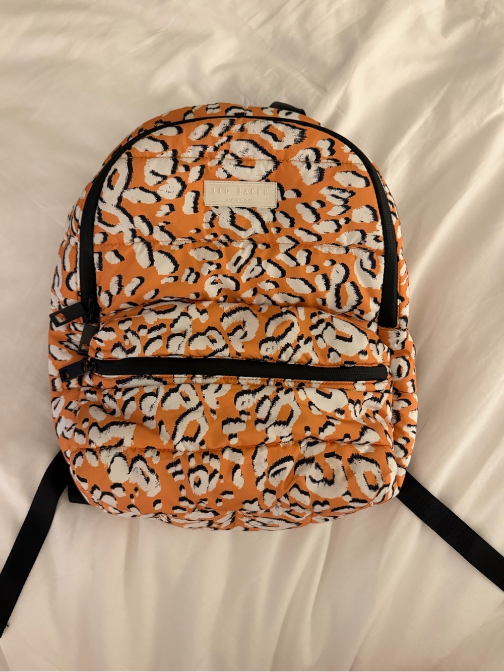 Ted Baker orange cheetah print backpack